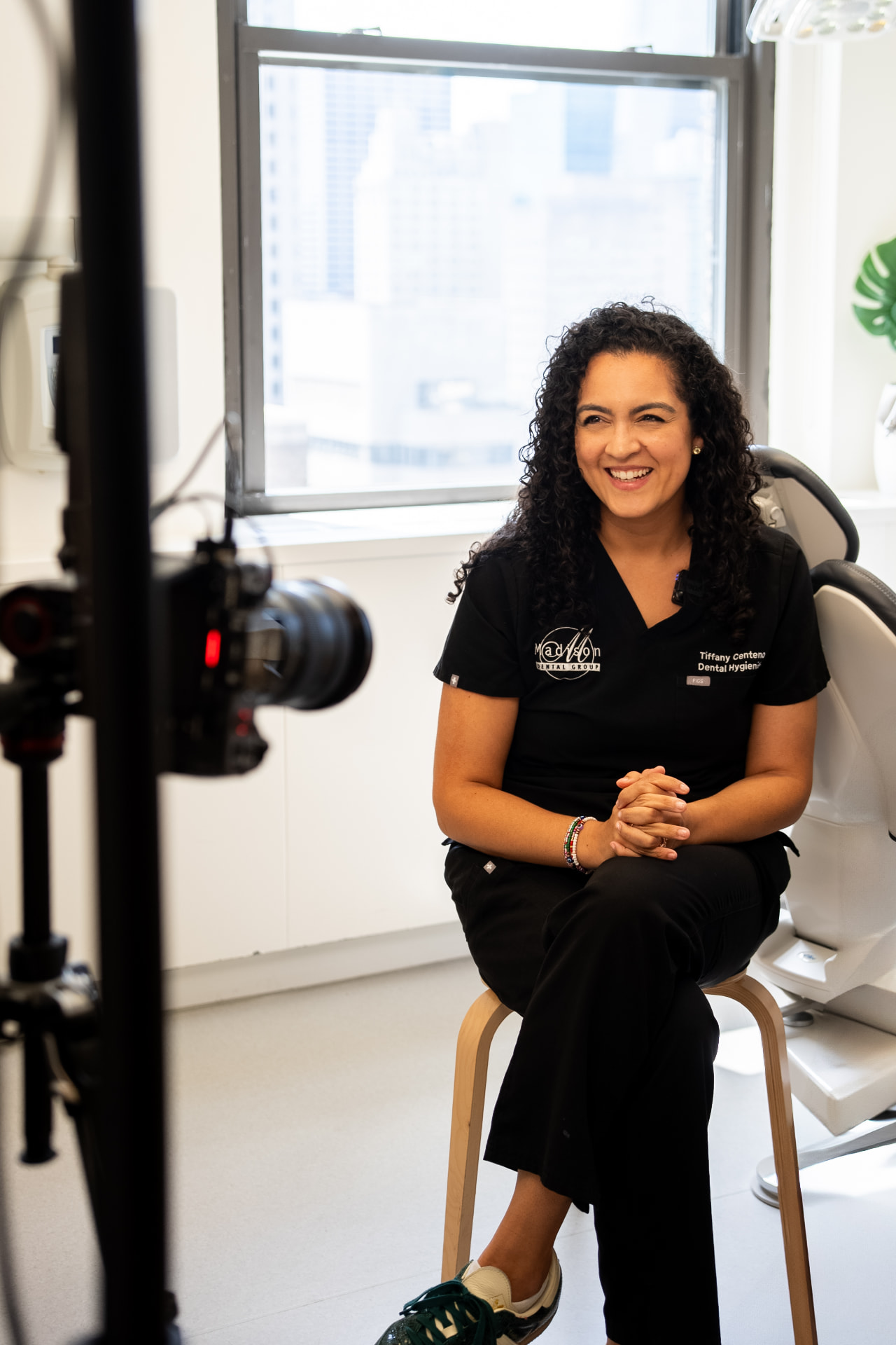 A Madison Dental Group hygienist on camera during an interview